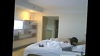 mom and son in shear bedroom in hotel