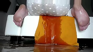 boy-showing-how-to-apply-delay-spray-on-penny
